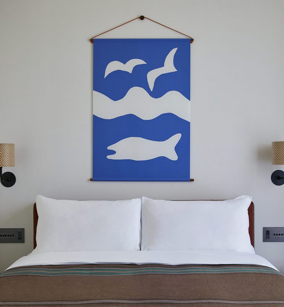 Hotel room with deluxe king-sized bed